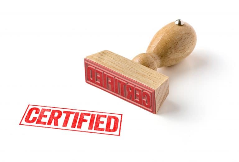 "CERTIFIED" on a rubber stamp on a white background