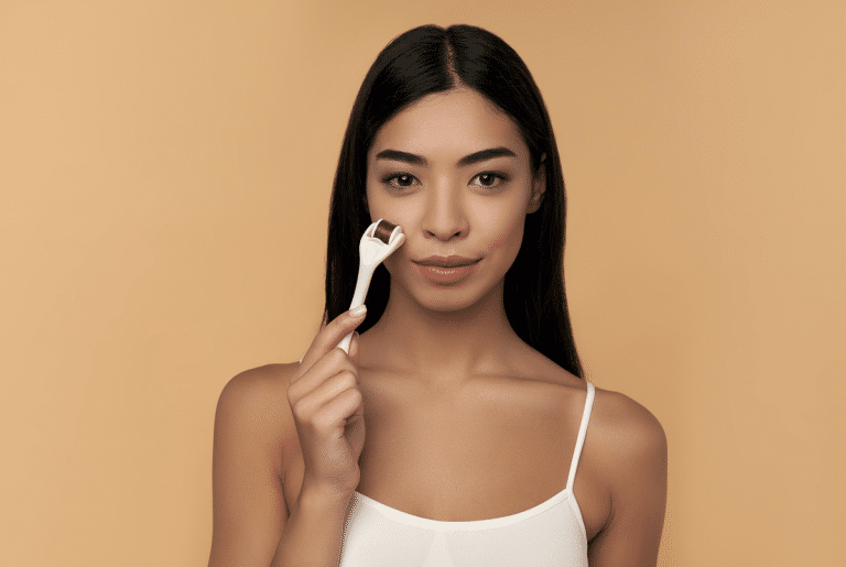 young woman using Microneedling on her face