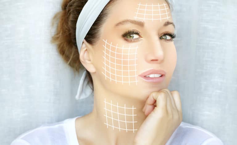 Dermal Filler Treatments grids on woman's face